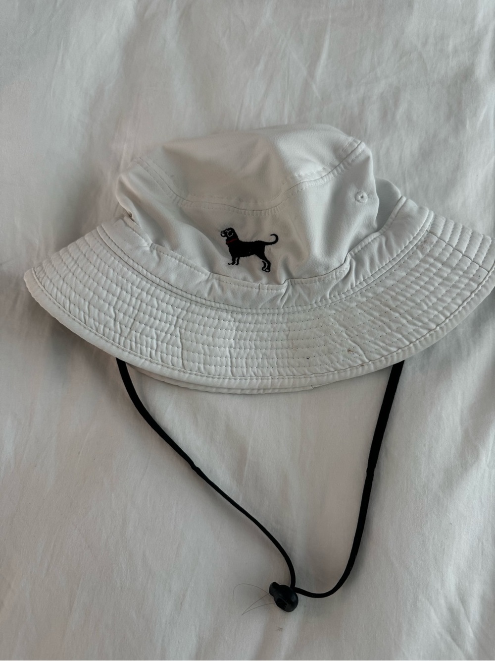 The Black Dog White Bucket Hat with Black Logo and Chin Strap